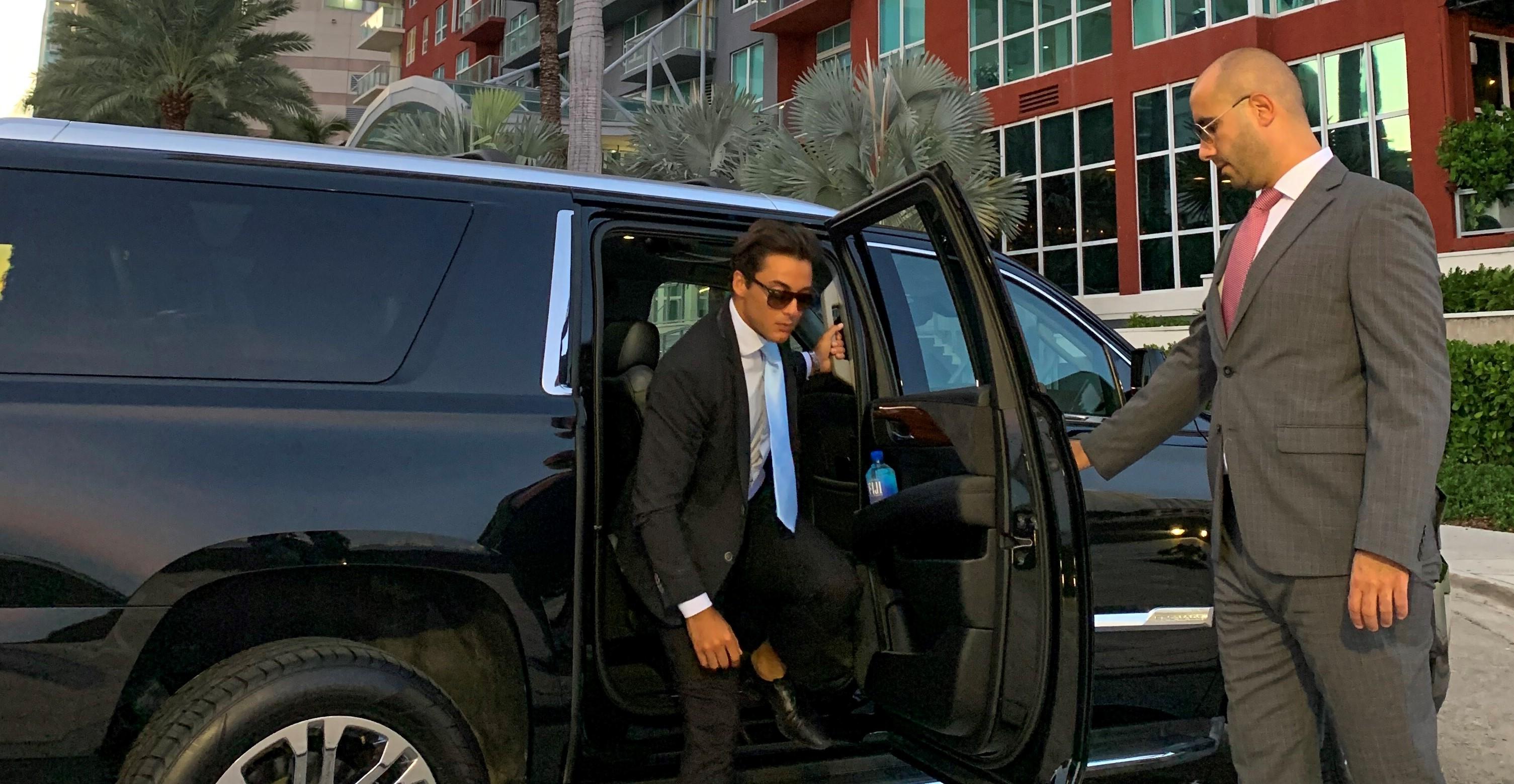 Man walking out of the limo